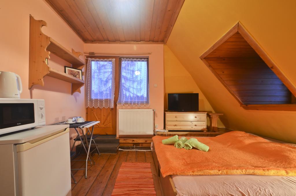 Panorama Tatr Hotell Zakopane Rom bilde
